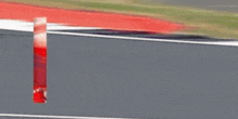 a picture of a man on a race track with the name dan on it