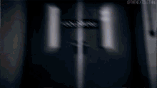 a blurry picture of a person 's spine with the words the nextblg thing written on the bottom