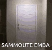 a white door with the words sammoute emba written on it