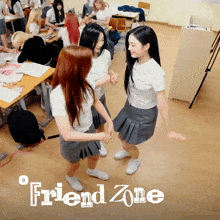 a group of girls are dancing in a classroom with the words friend zone on the bottom right