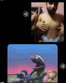 a screenshot of a sesame street video with a man taking a picture of himself