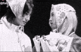 a black and white photo of a man and a woman