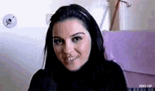 a close up of a woman 's face with the words rbd.gif below it .