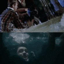a man is being thrown into a body of water while another man looks on