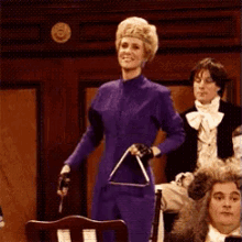 Ding! GIF - Kristen Wiig Triangle Ding GIFs