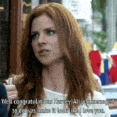 a woman with red hair says well congratulations harvey