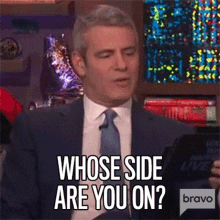 Whose Side Are You On Andy Cohen GIF - Whose Side Are You On Andy Cohen Watch What Happens Live With Andy Cohen GIFs
