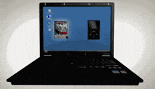 a laptop with a picture of a man on the screen is open to a windows desktop