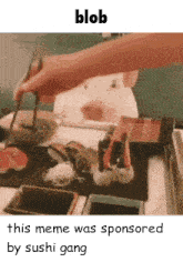 a pig is sitting at a table with chopsticks eating sushi .