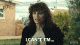a woman with curly hair says i can 't i 'm ...