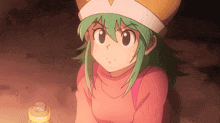 a girl with green hair is wearing a pink shirt and a white hat