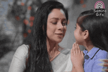 a little girl whispering into a woman 's ear with a sam gifs logo behind them