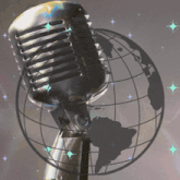 a microphone is surrounded by a globe with stars on it
