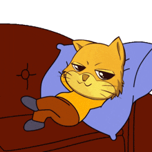 a cat laying on a couch with a blue pillow