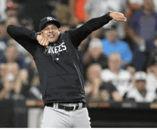 a man wearing a black shirt that says kees