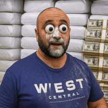 a man wearing a west central performance shirt