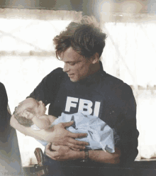Spencer Reid Cuddle GIF - Spencer Reid Cuddle Baby GIFs