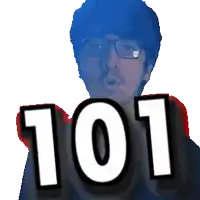 a man with glasses holds up the number 101 in front of his face