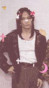 a man with long hair is wearing a black jacket