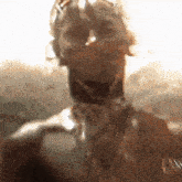 a close up of a person 's face with a crown on it