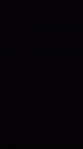 a black background with white smoke coming out of the middle