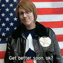 a man standing in front of an american flag with the words get better soon ok