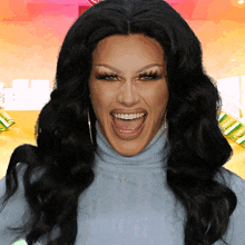 a woman with long black hair is smiling and wearing a blue turtleneck sweater