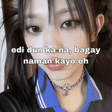 a girl wearing a choker with the words edi dun ka na bagay naman kayo eh written on it