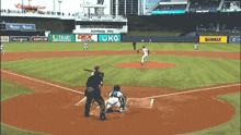 a baseball game is being played in a stadium sponsored by dewalt and automakers alley