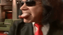 Gene Simmons Does What He Does Best GIF - Gene Simmons Tongue Talent GIFs