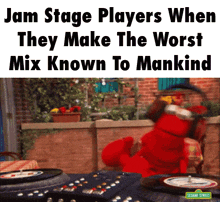 elmo from sesame street is playing a record on a record player