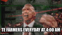 a man in a suit and tie is giving a speech with the words te farmers everyday at 4:00 am