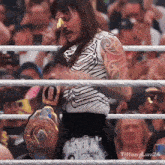 a man in a boxing ring with the hashtag tiffanyluv24 on the bottom