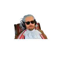 a man wearing a wig and sunglasses is pointing at his head