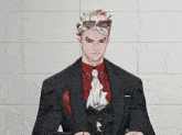 a man in a suit with a red shirt and tie has sunglasses on