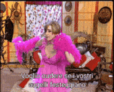 a woman in a pink dress with the words voglio oudere se i vostri augelli festeggiano written below her