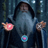 a man with a beard is holding two coins in his hands one of which has the letter x on it