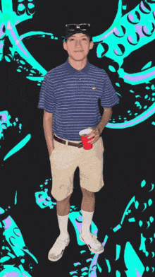 a man in a striped shirt holds a red cup in front of an octopus