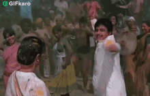 throw colored powder gifkaro playing around celebrating holi holi