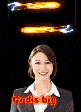 a woman in a suit is smiling and the words gadis big are behind her