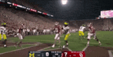 a football game between michigan and oklahoma is being played