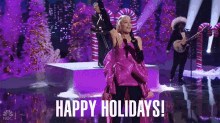 Happy Holidays Gwen Stefani GIF - Happy Holidays Gwen Stefani Rockefeller Christmas GIFs