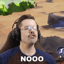 a man wearing headphones says nooo in front of a video game screen