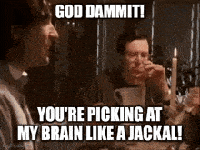 two men are sitting at a table with candles and drinking wine . one of the men is saying `` god dammit ! ''