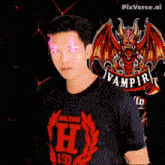 a young man wearing a shirt that says vampire