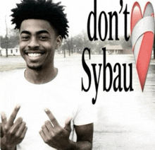 a man wearing a shirt that says " do n't sybau " on it