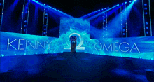 kenny omega is shown on a large screen