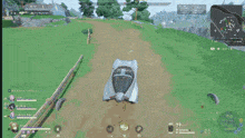 a screenshot of a video game shows a car in the grass and a tree