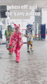 a group of clowns are walking down a street with a caption that says when me and the gang pull up