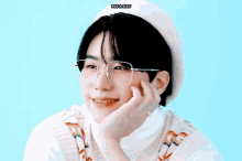 a young man wearing glasses and a white hat has the word fit-a-fat on the bottom